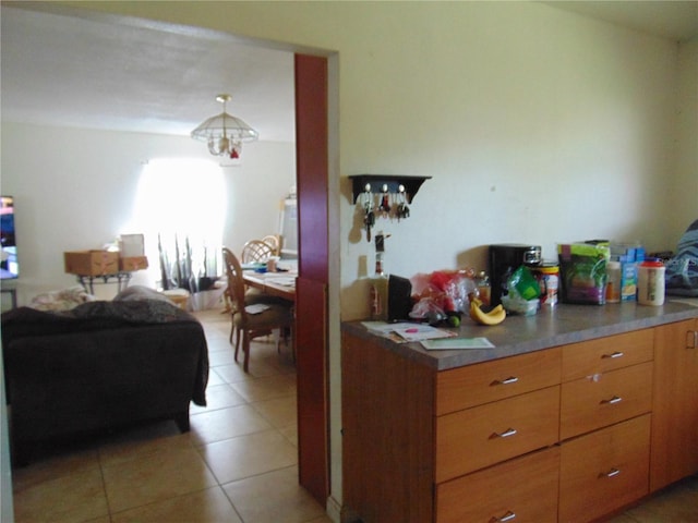 kitchen with light tile patterned floors