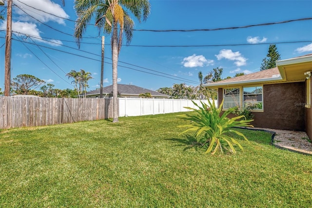 view of yard featuring fence