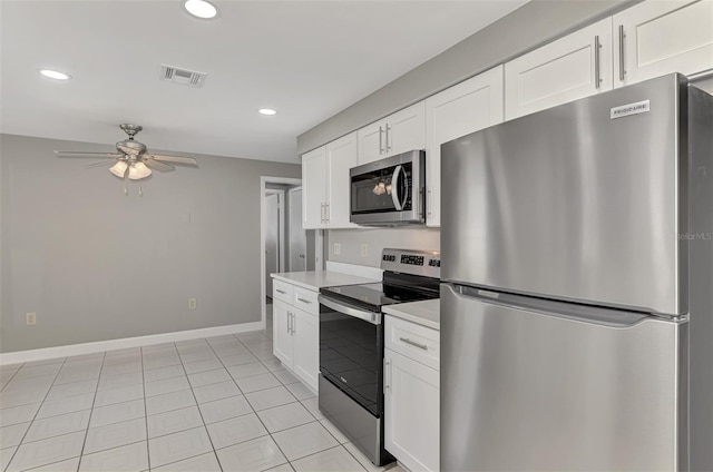 kitchen with visible vents, white cabinets, appliances with stainless steel finishes, light countertops, and recessed lighting