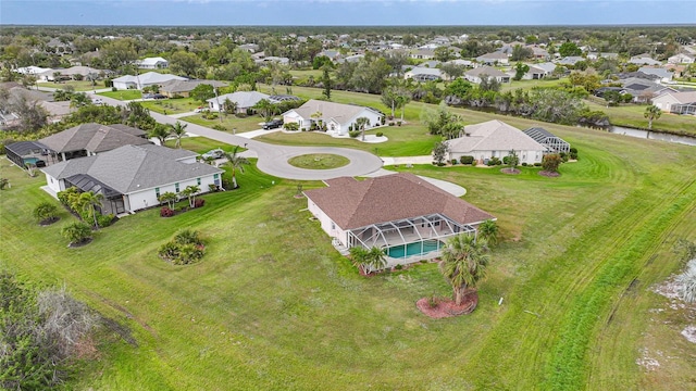 birds eye view of property with a residential view