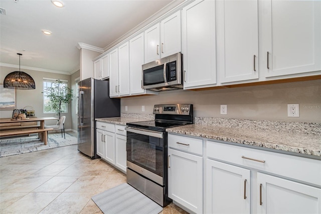 kitchen featuring light stone counters, appliances with stainless steel finishes, white cabinetry, and ornamental molding