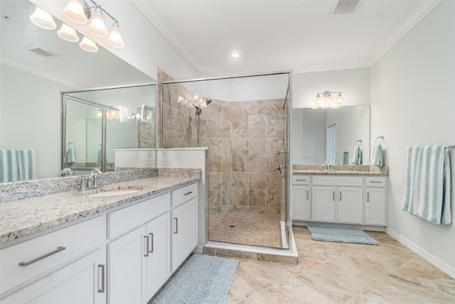 full bath with ornamental molding, visible vents, and a sink