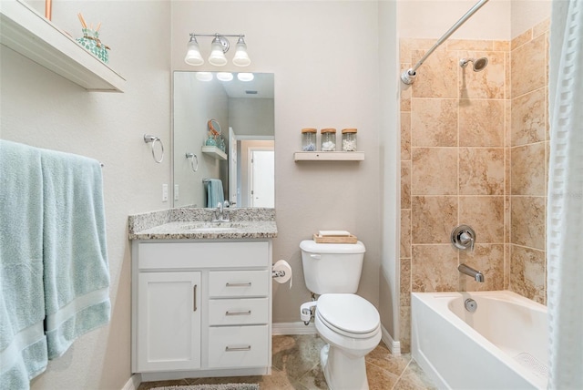 full bath with vanity, baseboards, tile patterned flooring, shower / bath combination, and toilet