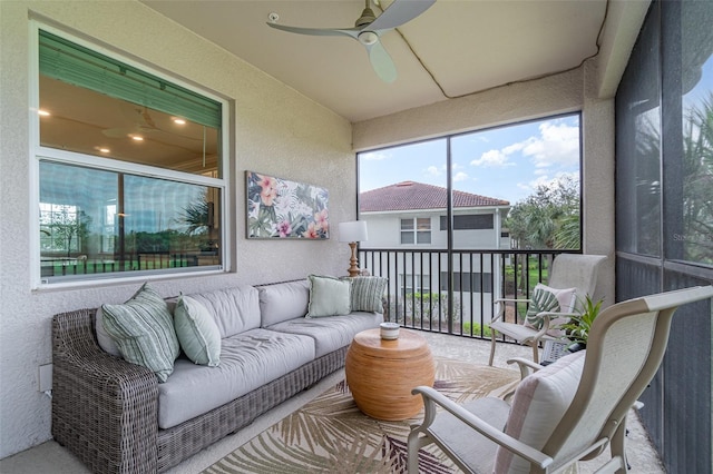 sunroom / solarium with ceiling fan