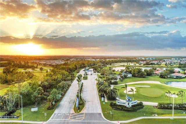 view of property's community featuring a water view and golf course view