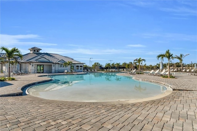 pool featuring a patio area