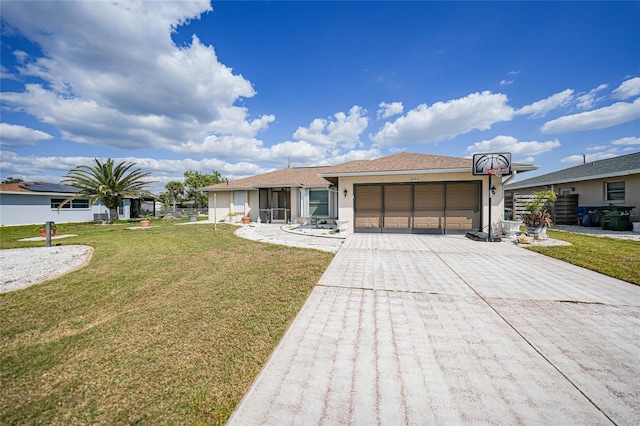 view of front facade with a front yard, decorative driveway, an attached garage, and stucco siding