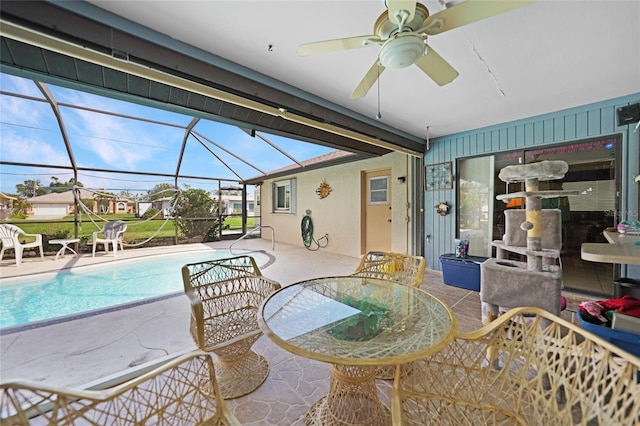 view of pool featuring ceiling fan