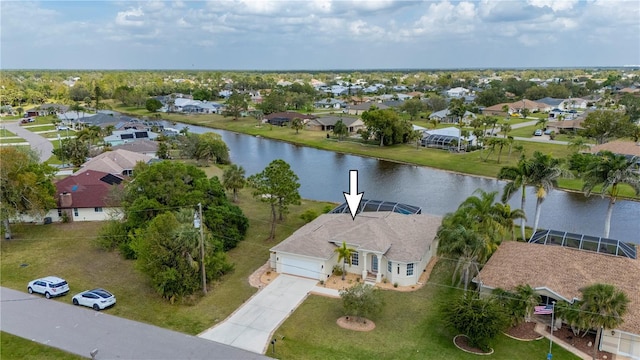 aerial view featuring a residential view and a water view