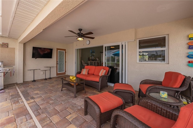 view of patio / terrace with outdoor lounge area and ceiling fan