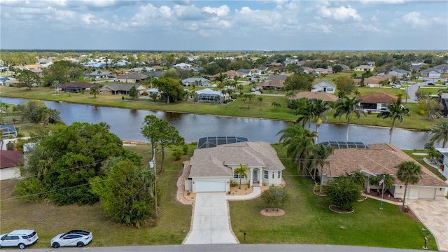 bird's eye view featuring a residential view and a water view