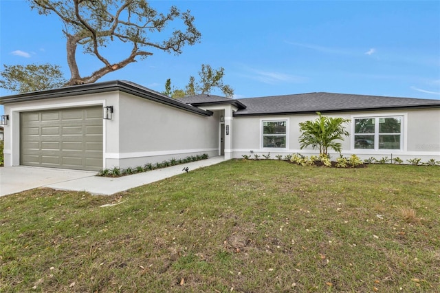 view of front facade featuring a front lawn, a garage, driveway, and stucco siding