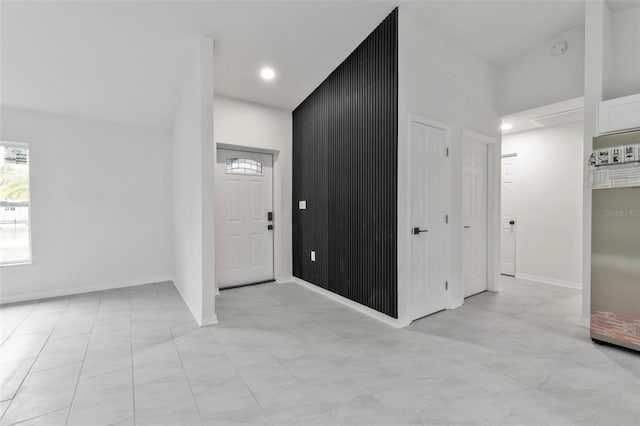 entrance foyer featuring baseboards