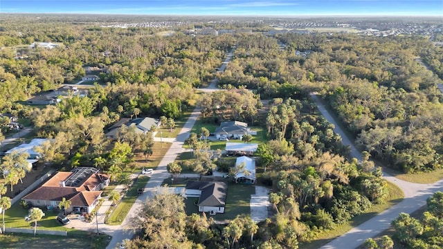 bird's eye view featuring a view of trees