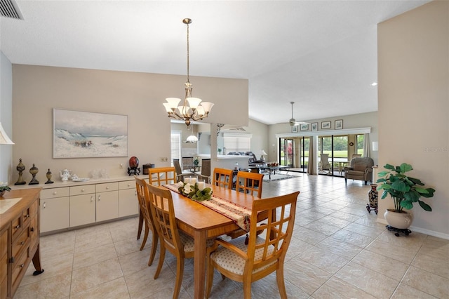 dining room featuring an inviting chandelier, vaulted ceiling, baseboards, and visible vents