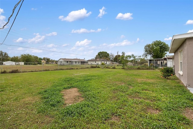 view of yard with fence