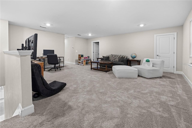 carpeted living room with baseboards and recessed lighting