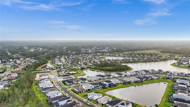 aerial view featuring a water view and a residential view