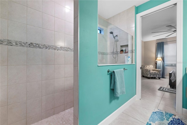 full bathroom with ensuite bathroom, a ceiling fan, walk in shower, baseboards, and tile patterned floors