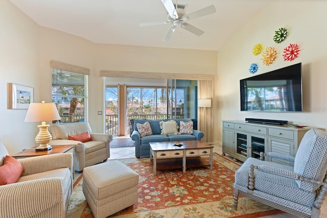 tiled living area featuring a ceiling fan and visible vents