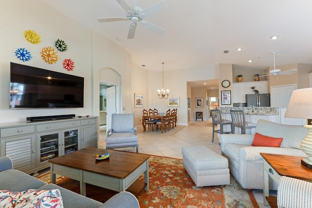 living room featuring visible vents, high vaulted ceiling, light tile patterned flooring, recessed lighting, and ceiling fan with notable chandelier