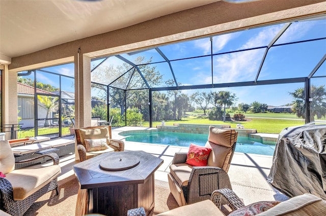 view of patio / terrace featuring glass enclosure, outdoor lounge area, and an outdoor pool