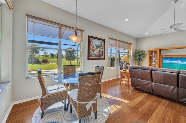 dining space featuring recessed lighting, ceiling fan, baseboards, and wood finished floors