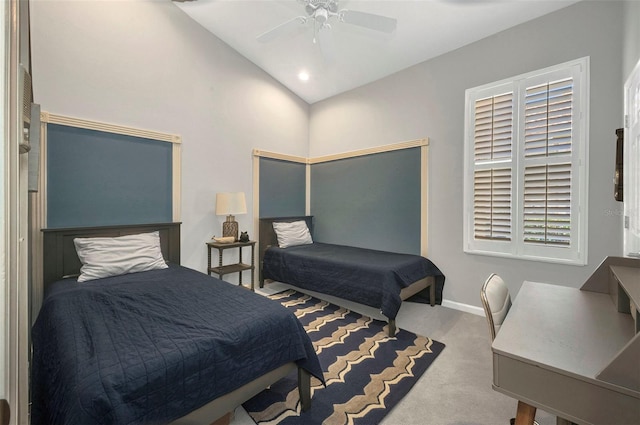 bedroom with lofted ceiling, carpet, a ceiling fan, and baseboards