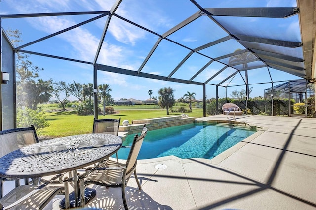 pool featuring a lanai, a lawn, and a patio