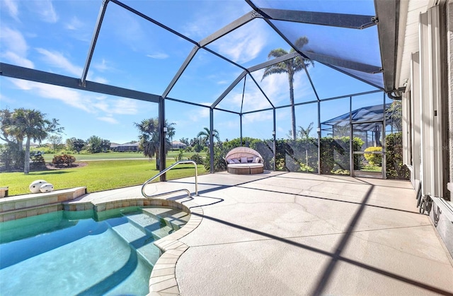 outdoor pool with a yard, a patio area, and a lanai