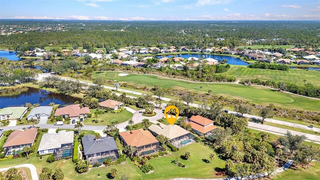 birds eye view of property featuring a residential view, a water view, and golf course view