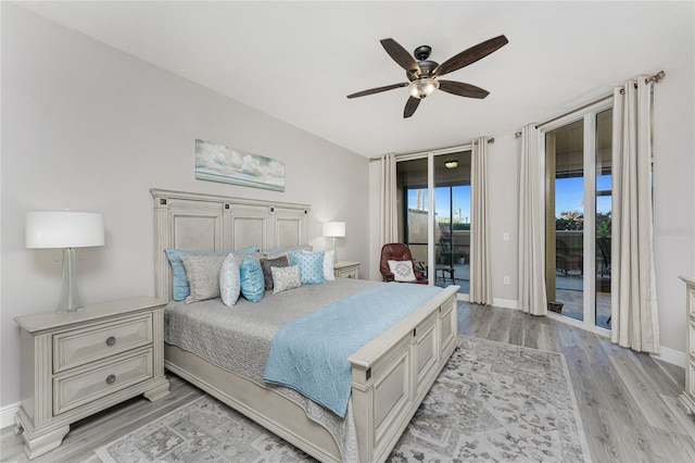 bedroom with baseboards, light wood-style floors, ceiling fan, and access to outside