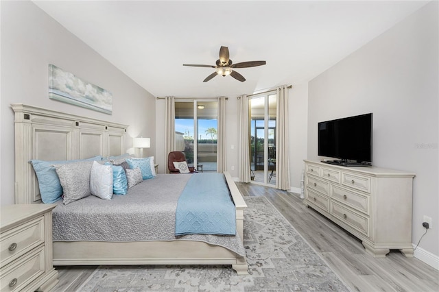 bedroom with access to exterior, light wood-style flooring, a ceiling fan, and baseboards