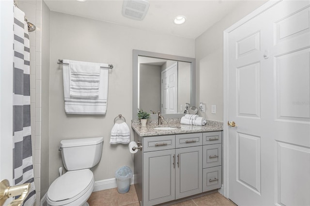 full bathroom with visible vents, toilet, tile patterned flooring, baseboards, and vanity