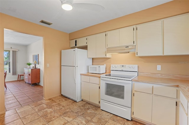 kitchen featuring light countertops, visible vents, a ceiling fan, white appliances, and under cabinet range hood