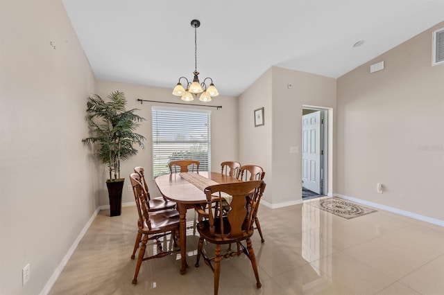 dining room featuring light tile patterned floors, visible vents, baseboards, and a notable chandelier