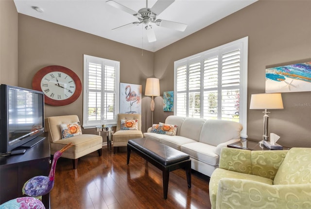 living room featuring ceiling fan and wood finished floors