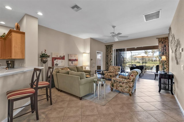 living area featuring recessed lighting, visible vents, ceiling fan, and light tile patterned flooring