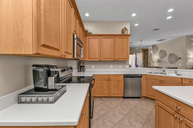 kitchen featuring visible vents, a sink, recessed lighting, appliances with stainless steel finishes, and light countertops