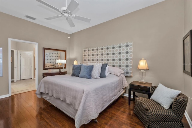 bedroom with baseboards, wood-type flooring, visible vents, and a ceiling fan