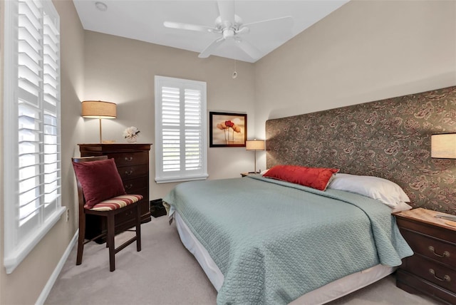 bedroom with carpet flooring, ceiling fan, and baseboards