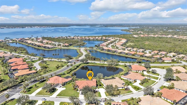 aerial view with a residential view and a water view