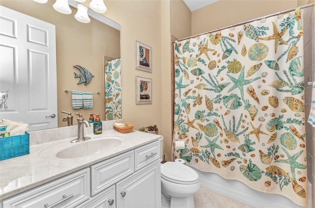 bathroom with vanity, toilet, shower / bath combo, and tile patterned flooring