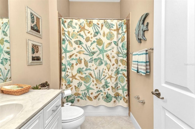 bathroom with vanity, tile patterned floors, toilet, and shower / bath combo with shower curtain