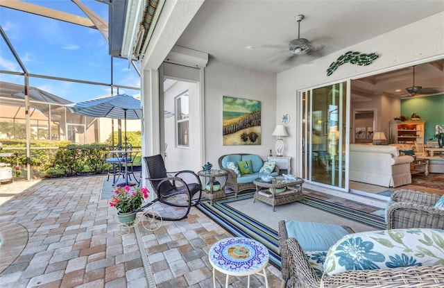 view of patio with glass enclosure, an outdoor hangout area, and ceiling fan