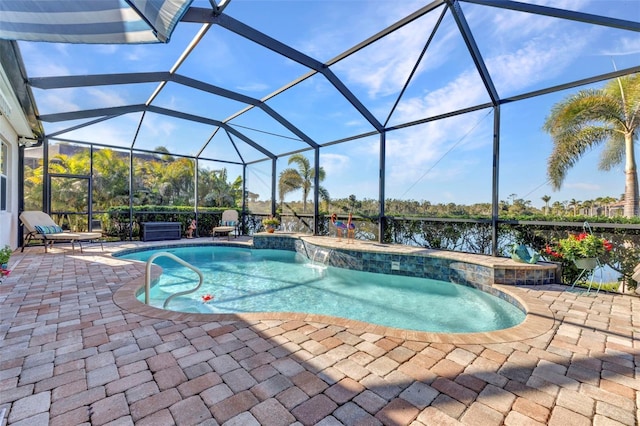 pool featuring a lanai and a patio area