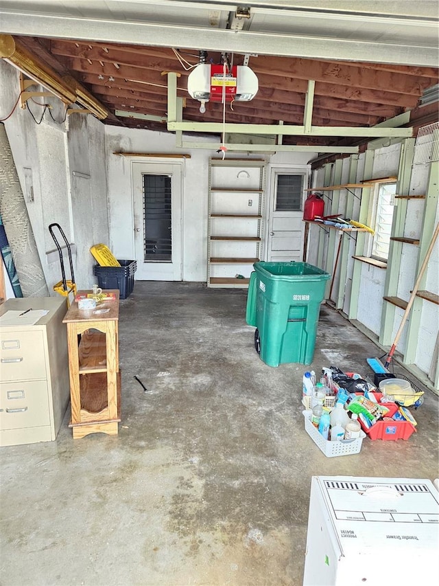 garage featuring a garage door opener