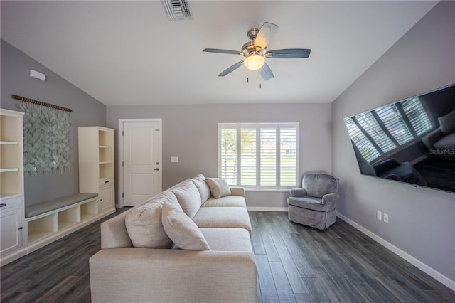 living room with ceiling fan, visible vents, baseboards, vaulted ceiling, and dark wood-style floors