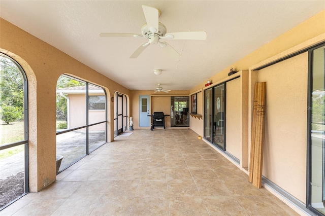 unfurnished sunroom with a healthy amount of sunlight