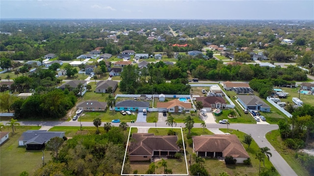 birds eye view of property with a residential view